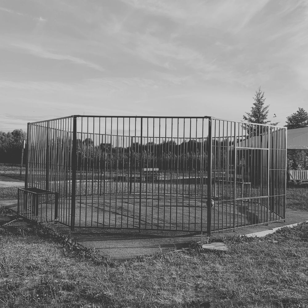 Octagonal steel panna football cage court for street and urban use – safe and durable structure for youth games.